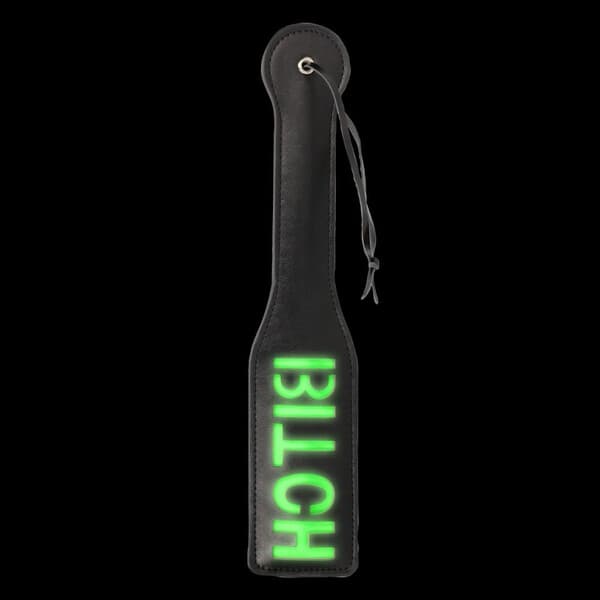 Paddle with glow-in-the-dark inscription BITCH